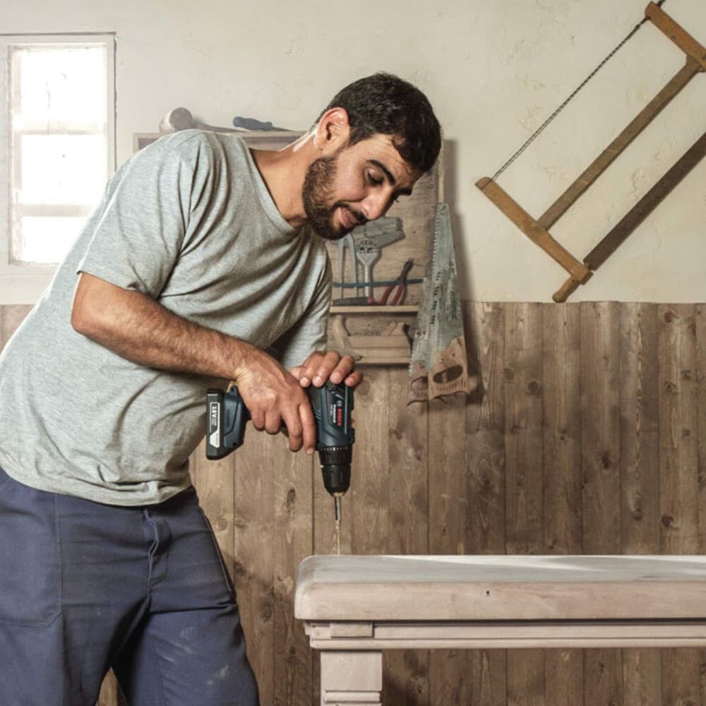 Bosch GSR 180 Li Akumulatorska bušilica - odvrtač 18V, 2x2,0Ah u koferu + 23-delni set pribora - slika 4